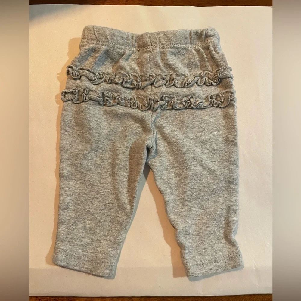 Newborn size heathered gray ruffled bottom pants